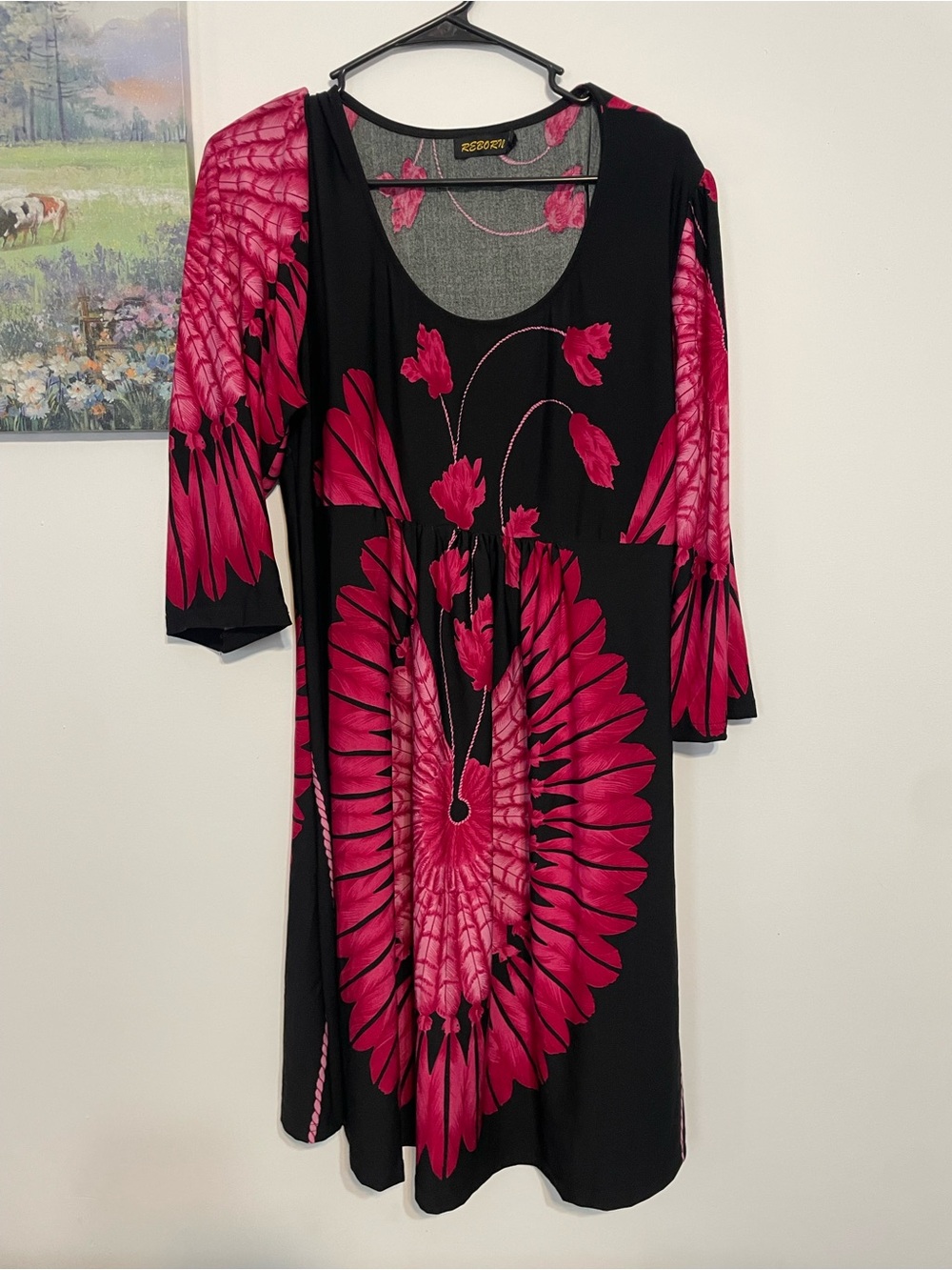 Reborn Black Tunic with Vibrant Pink Floral Burst